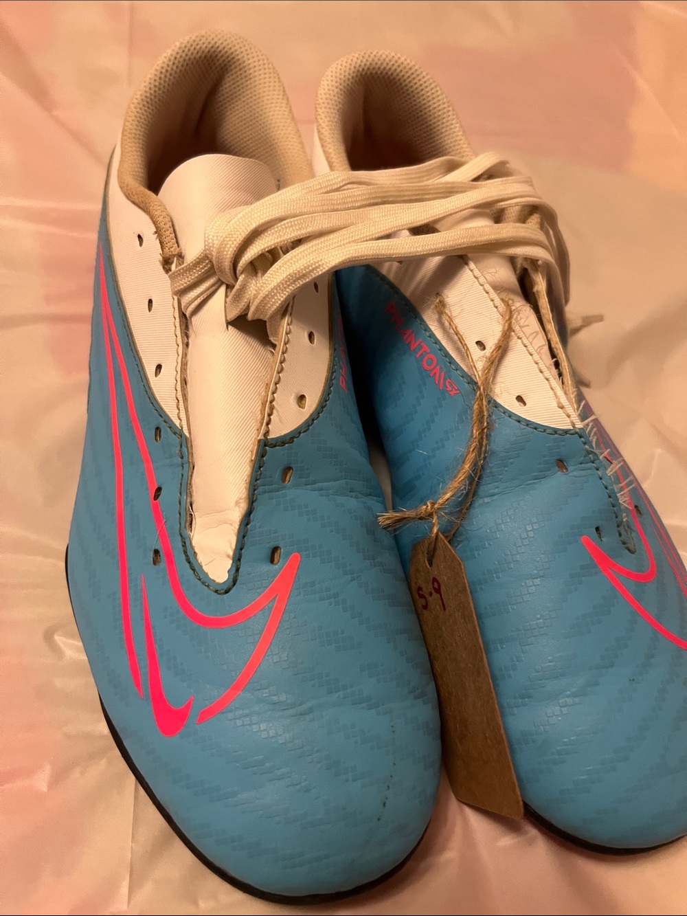 Nike Men’s Blue Athletic Soccer Shoes with Pink Swoosh